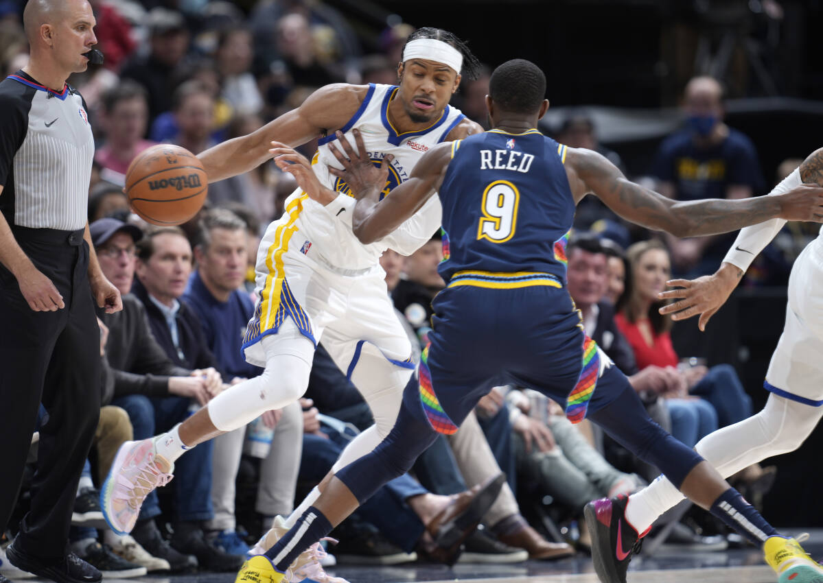 Jokic's Triple-double Leads Nuggets Past Warriors 131-124 - Bloomberg