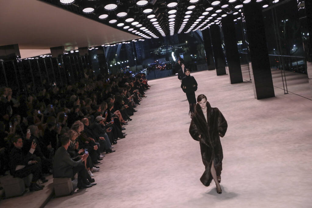 Louis Vuitton closes first audience-free Paris fashion week in Louvre, Paris fashion week