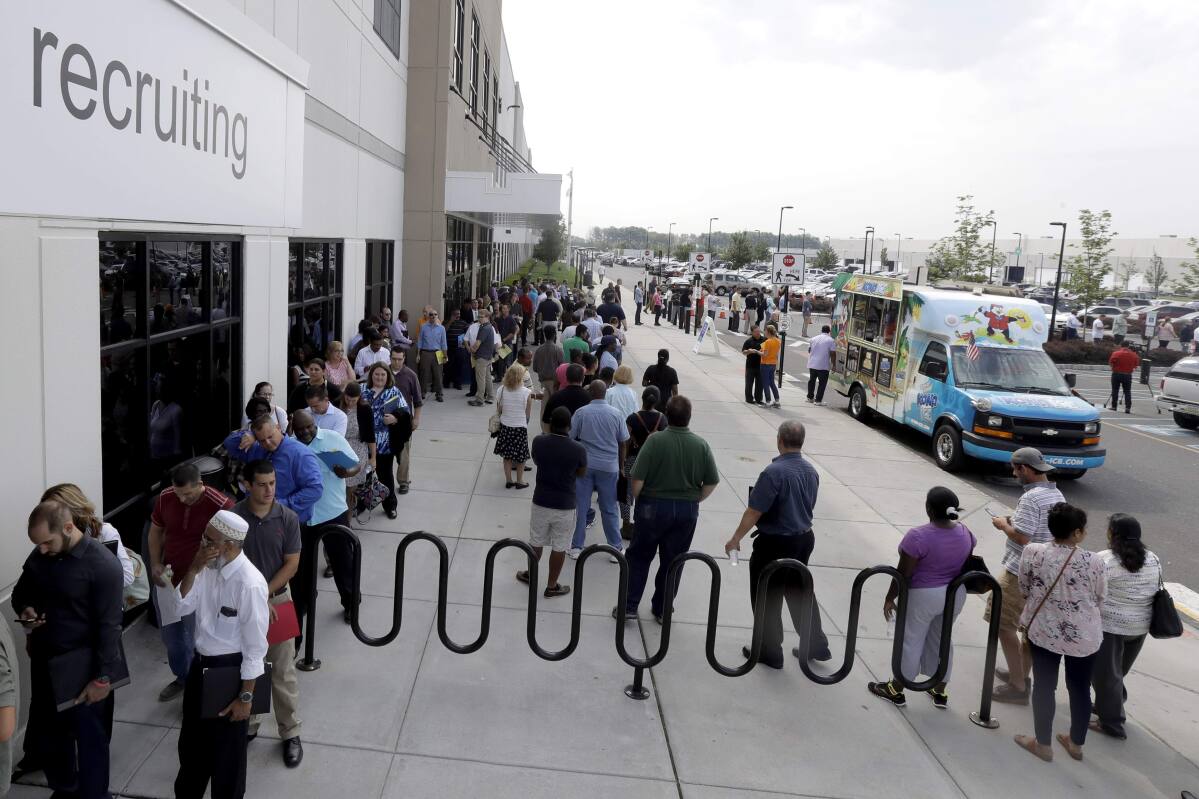 Hundreds Show Up for Jobs at  Warehouses in US Cities
