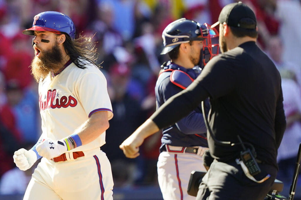 Photos from Phillies 8-3 playoff win over the Braves