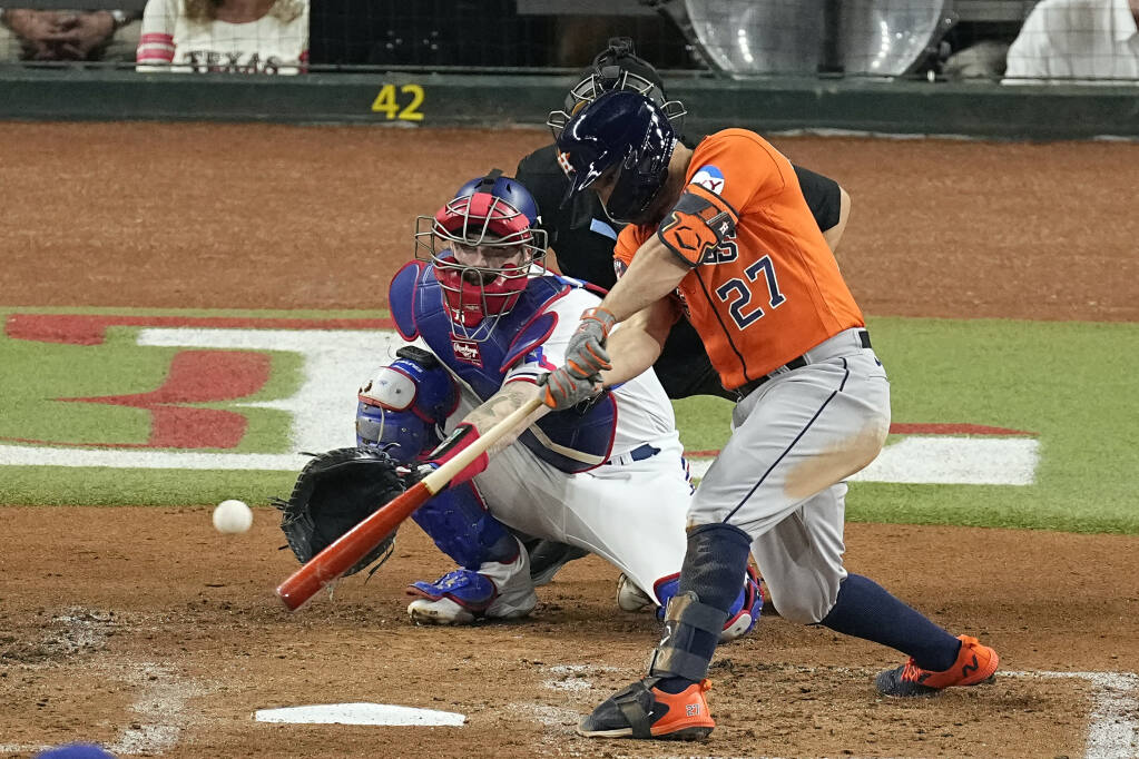 Altuve breaks out with 3 hits as Astros even World Series