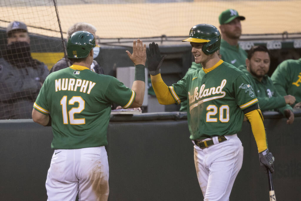 Oakland A's activate Mitch Moreland from injured list, option Luis