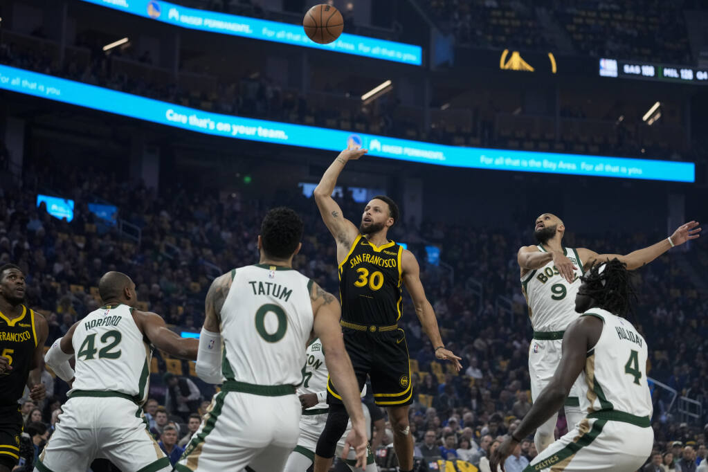 Stephen Curry scores 33 points, rallies Warriors past Celtics 132-126 in  overtime - The San Diego Union-Tribune