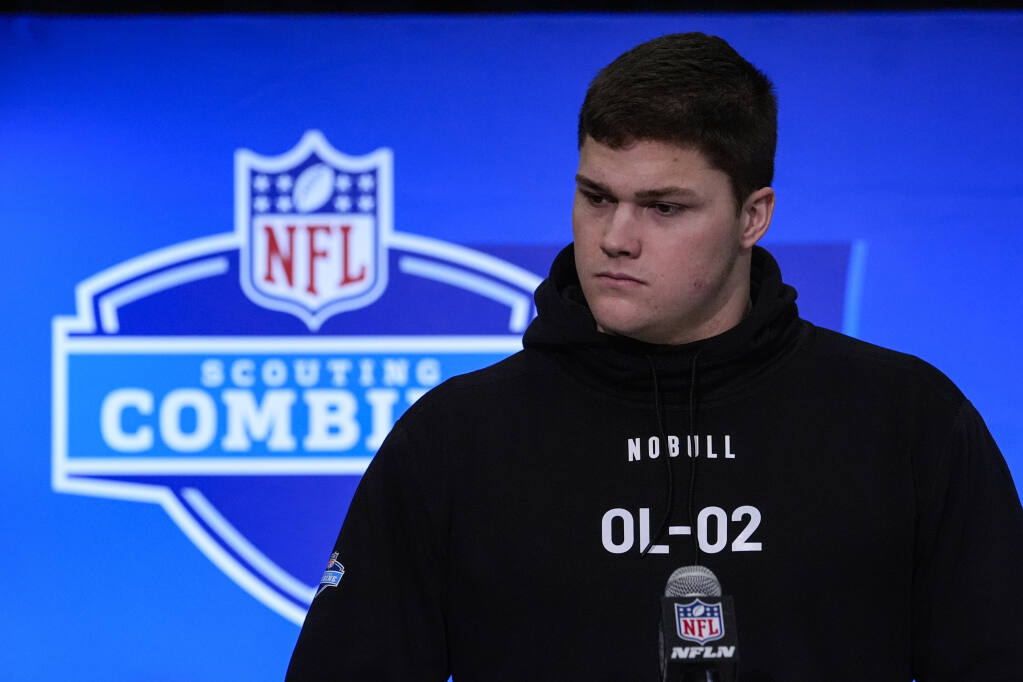 Family ties link a small group of NFL combine invitees to their famous  football fathers