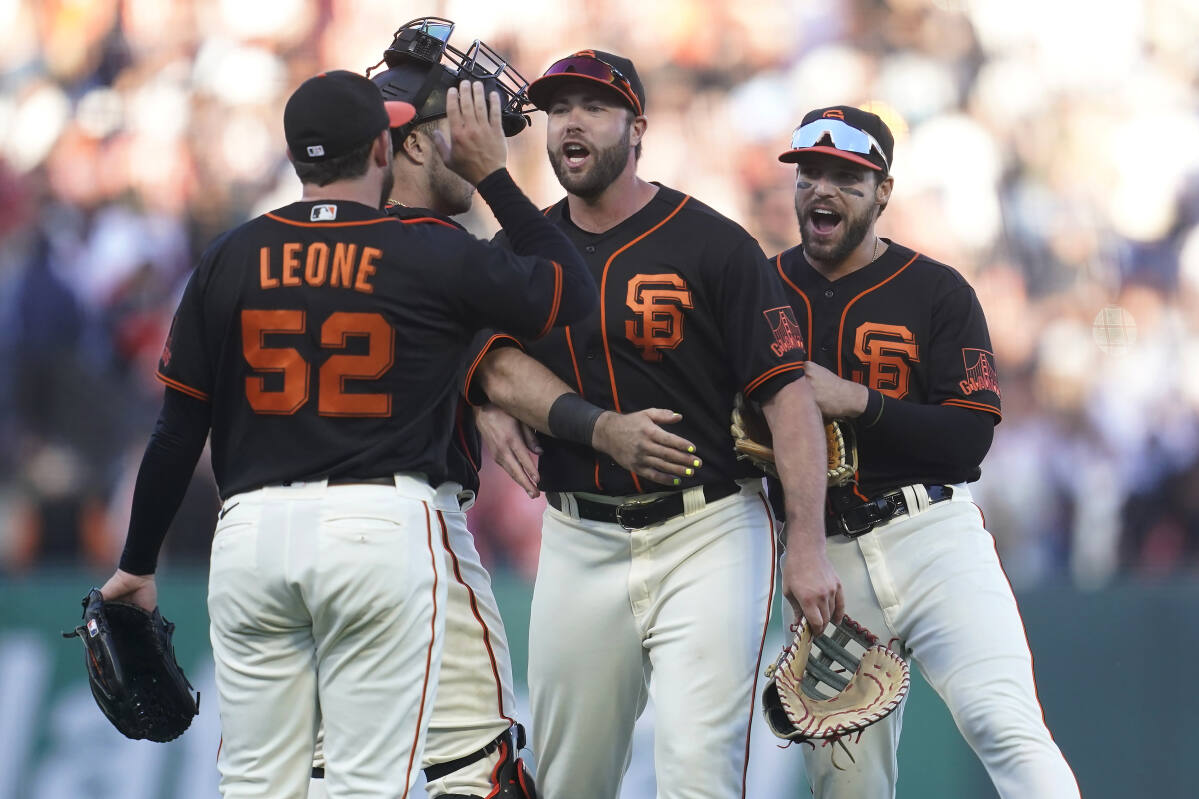 Evan Longoria of the San Francisco Giants hits a base loaded two-run
