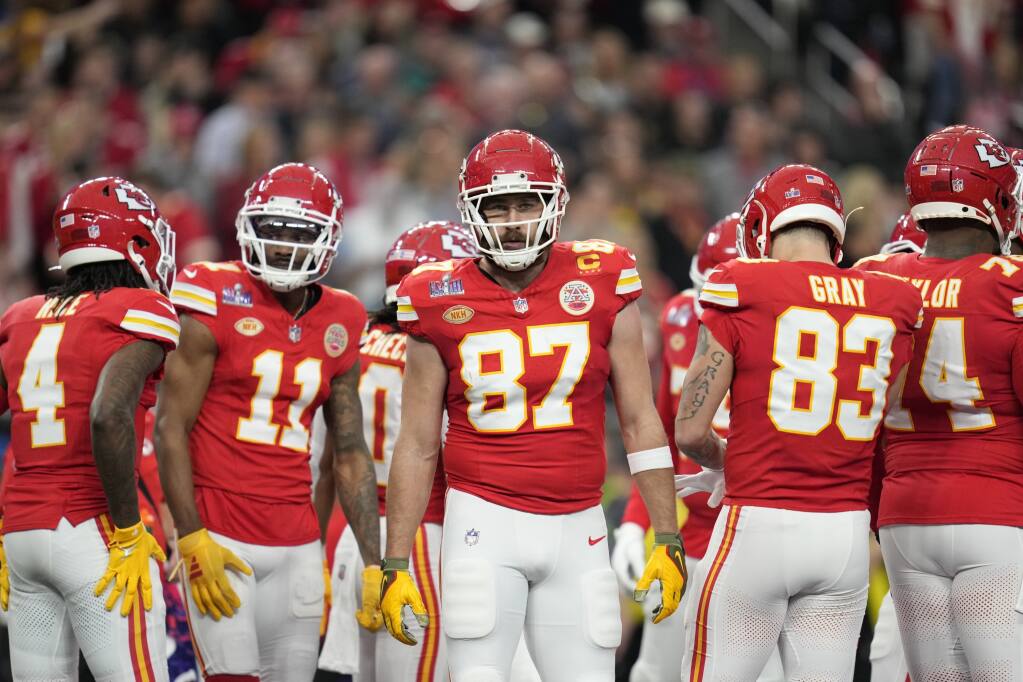 A frustrated Travis Kelce bumps Andy Reid, knocks the 65-year-old Chiefs  coach back a few steps