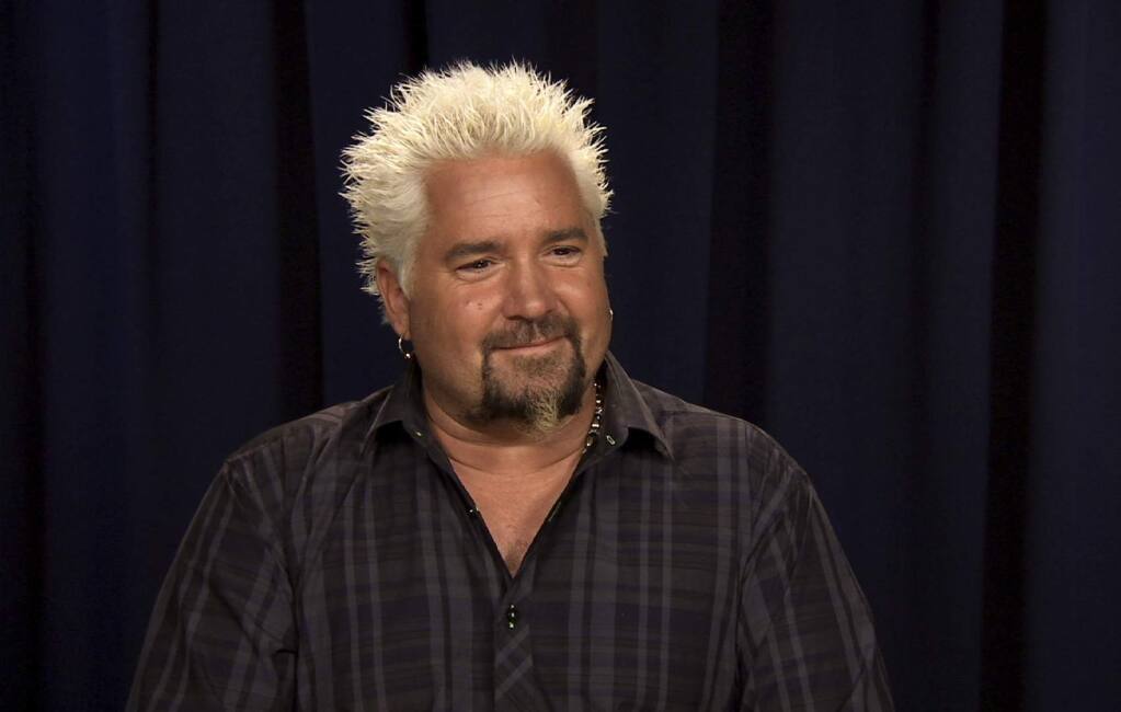 Guy Fieri Actually Hates His Famous Flame Shirt And Nothing In The