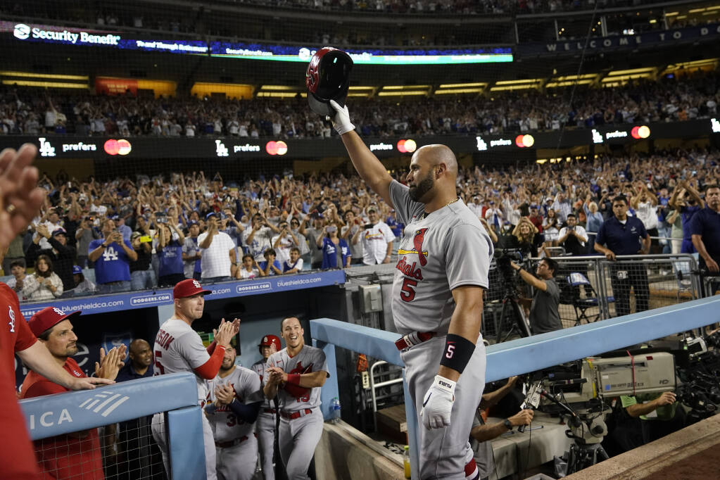 St. Louis Cardinals slugger Albert Pujols 'chases' baseball