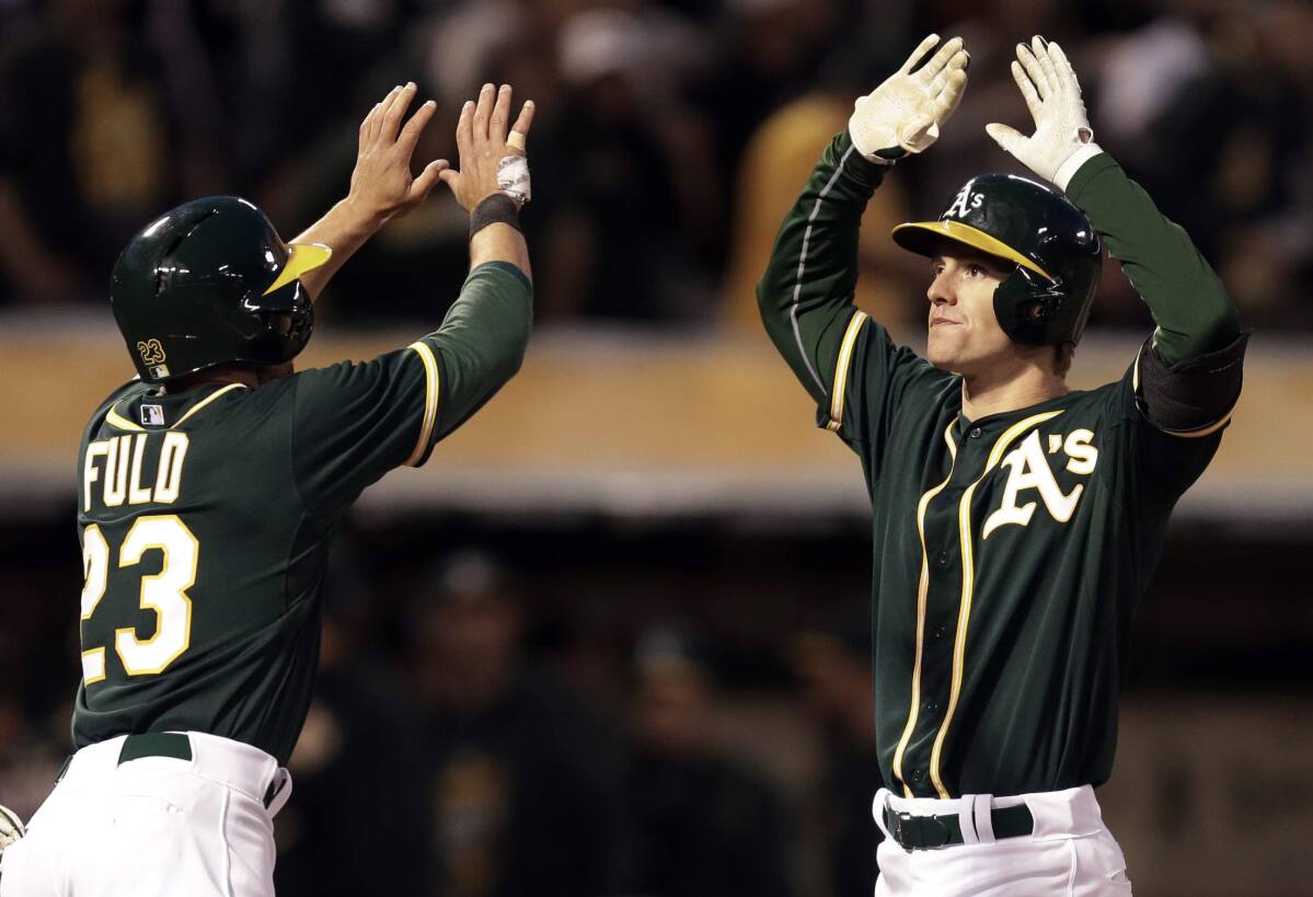 Mark Canha leads A's in 12-0 rout of Mariners