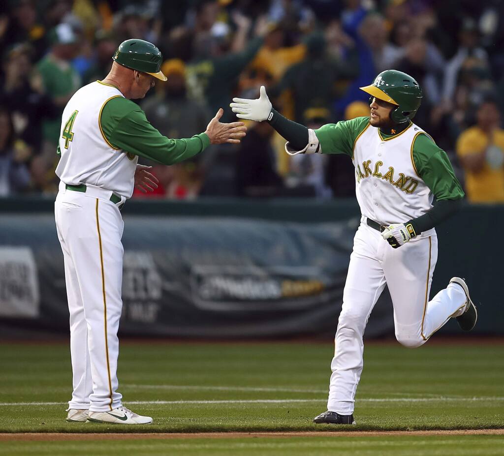 A's put on a show in 10-2 win on 50th anniversary in Oakland