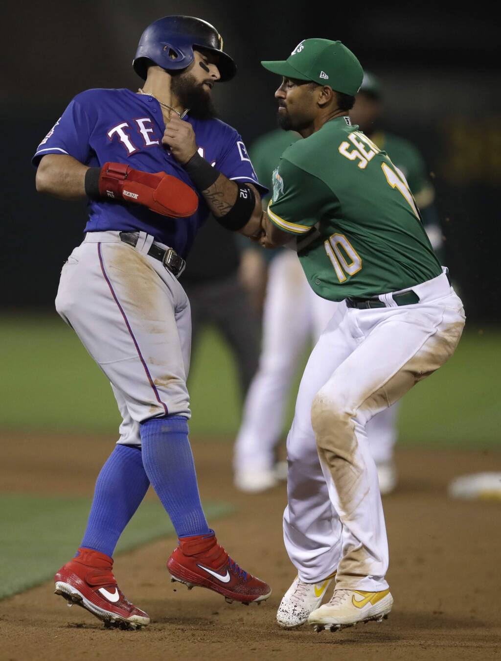 Texas Rangers' Shin-Soo Choo hits a sacrifice fly to score Rougned