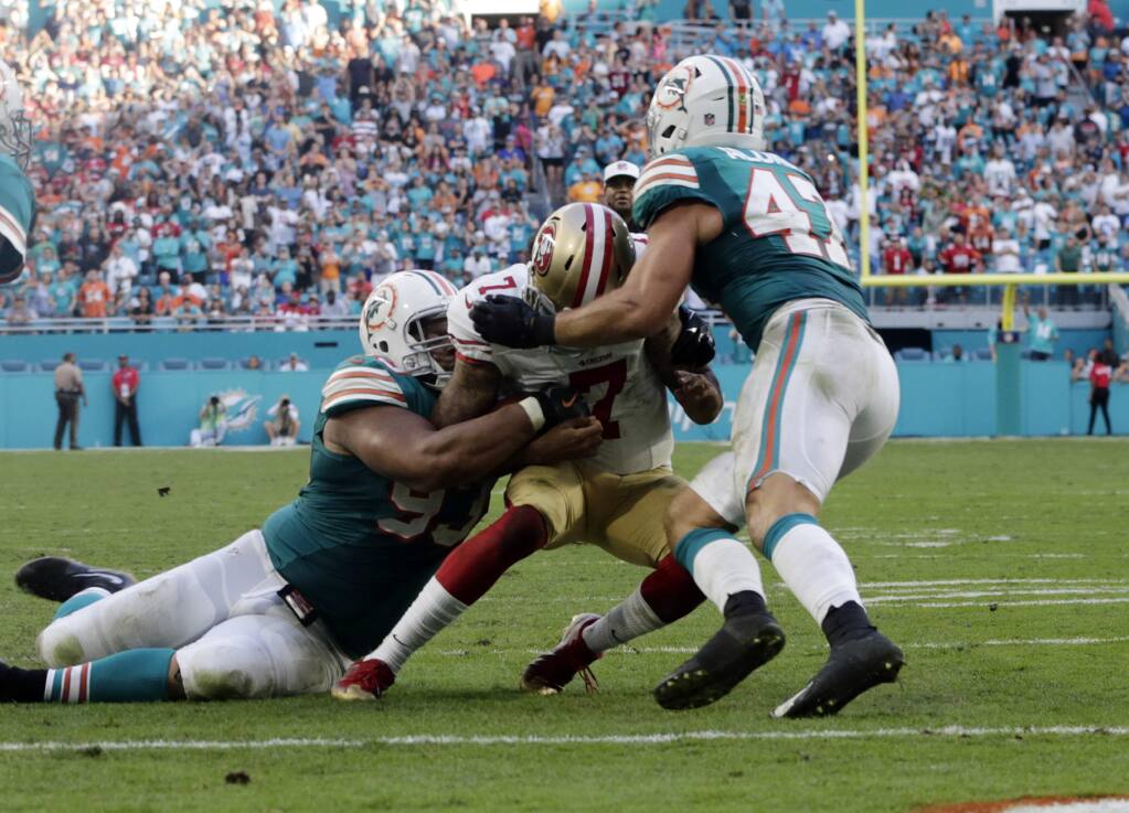 Colin Kaepernick stopped at 2 as Dolphins beat 49ers 31-24