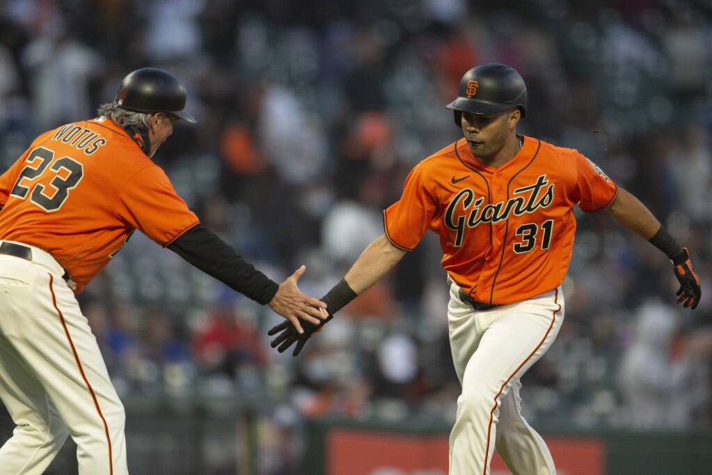 Padres keep playoff hopes alive, beat Giants 5-2 in 10 for 1st extra-inning  win