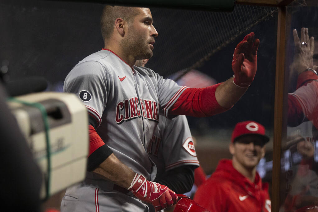 Votto returns to help Reds move into first place in NL Central - The  Tribune
