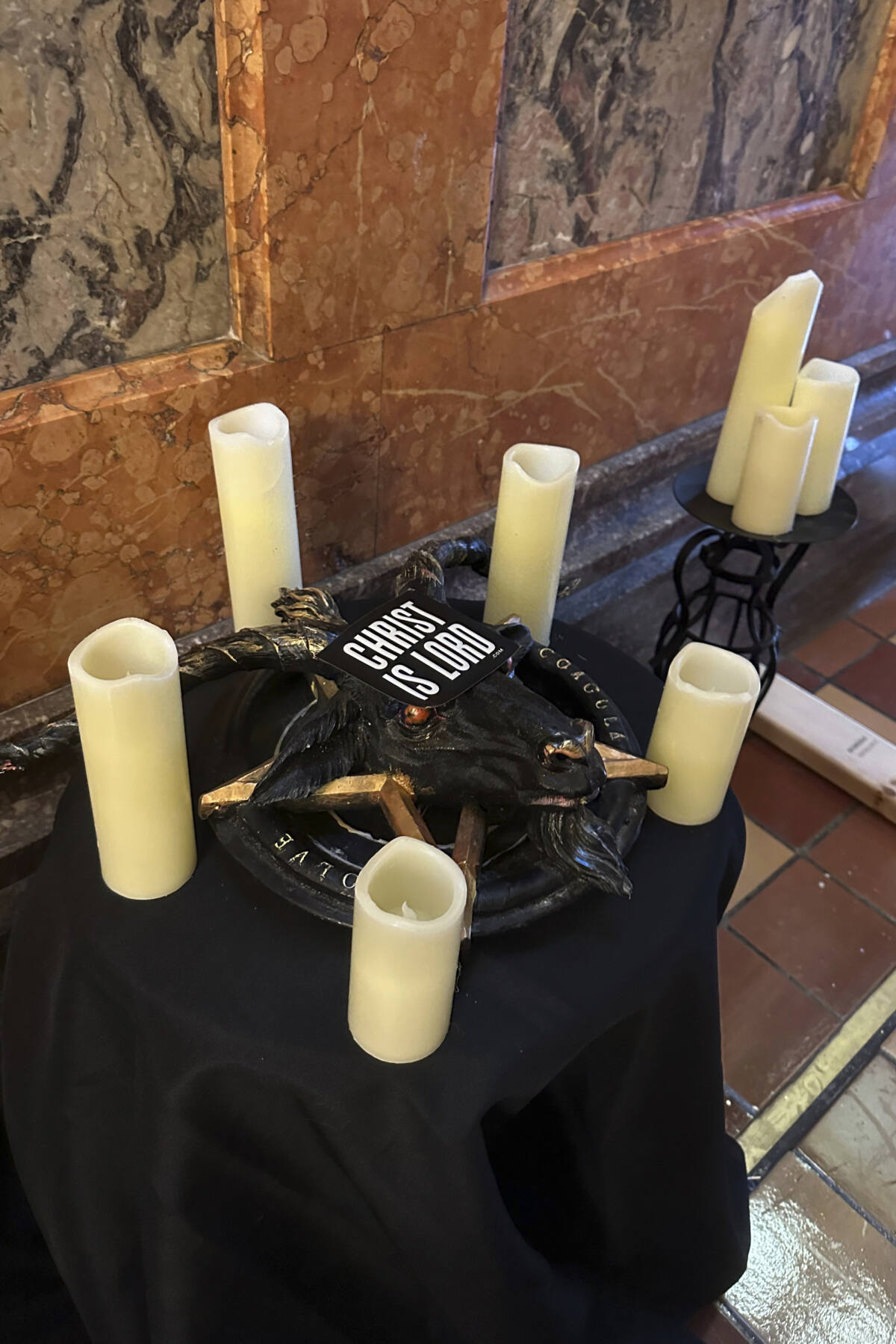 Ex-Mississippi House candidate charged after Satanic Temple display  destroyed at Iowa Capitol