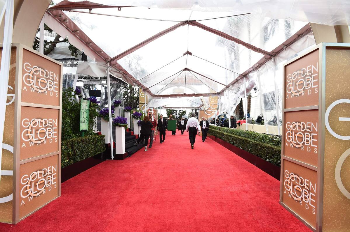 Grammys Attendees Brave L.A. Rain to Hit Red Carpet – The Hollywood Reporter
