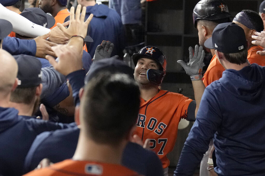 Altuve and Javier lead Astros to 8-5 win at Rangers as Houston