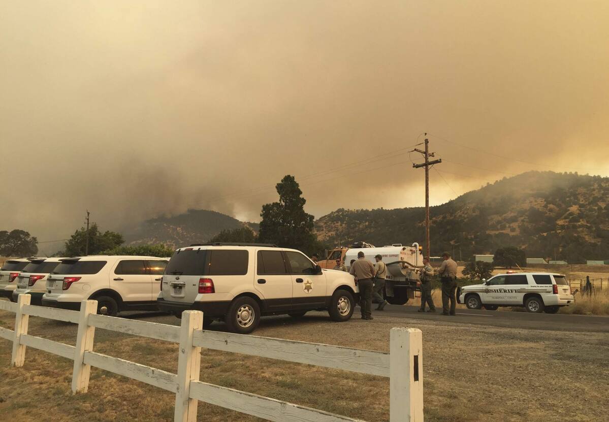 Evacuations ordered, roads closed in fire south of Yosemite