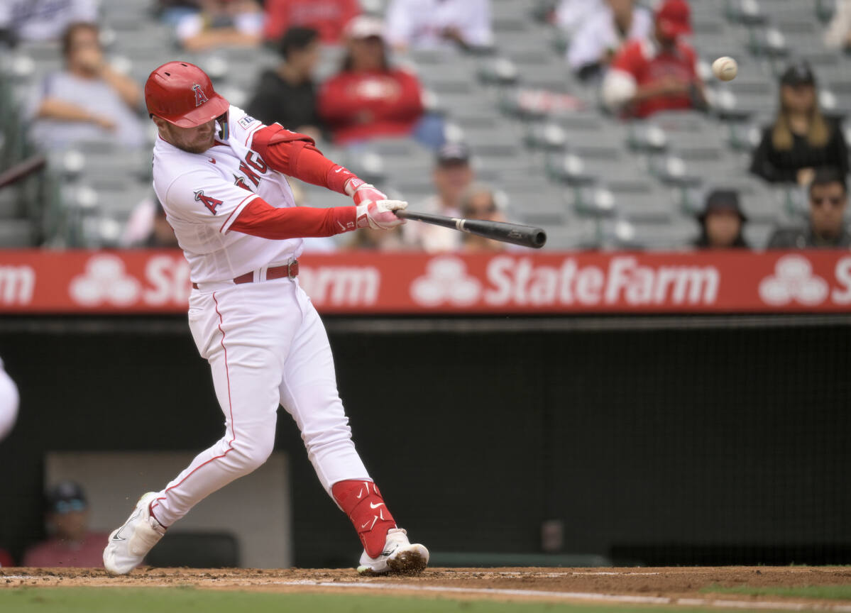 Los Angeles Angels second baseman Brandon Drury hits a single in the in  2023