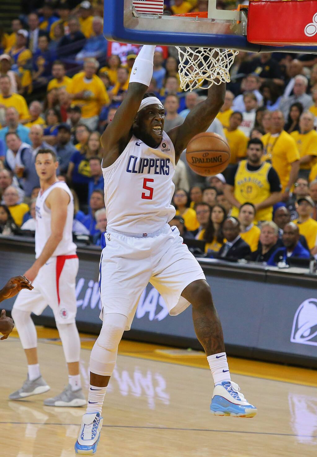 Los Angeles Clippers' Montrezl Harrell (5) celebrates after scoring against  the Houston Rockets during the second