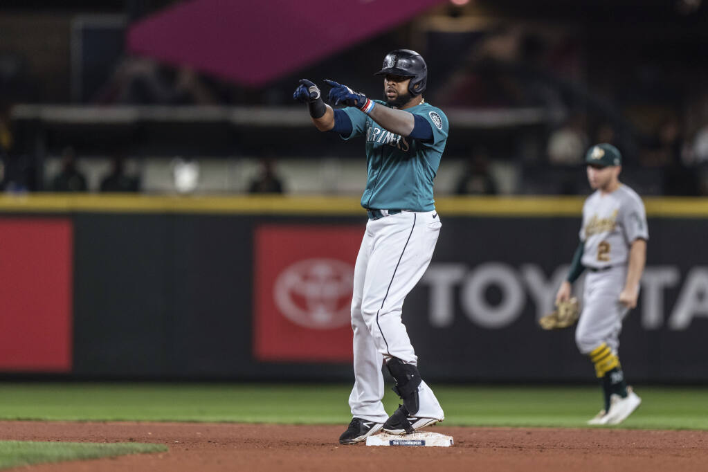 Moore homers twice and Rodriguez sets hits record as Mariners rout