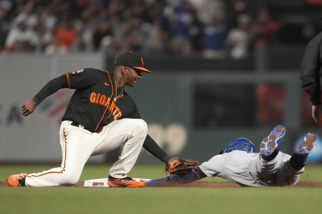 Dodgers spoil debut of interim Giants manager