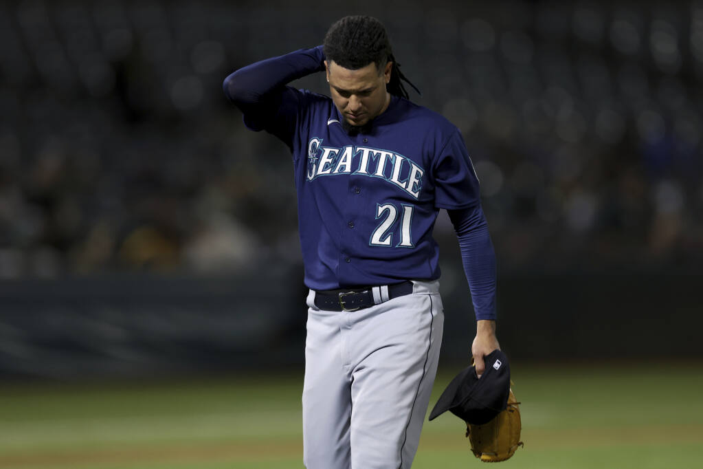 What is the Astros' magic number after loss to Mariners?