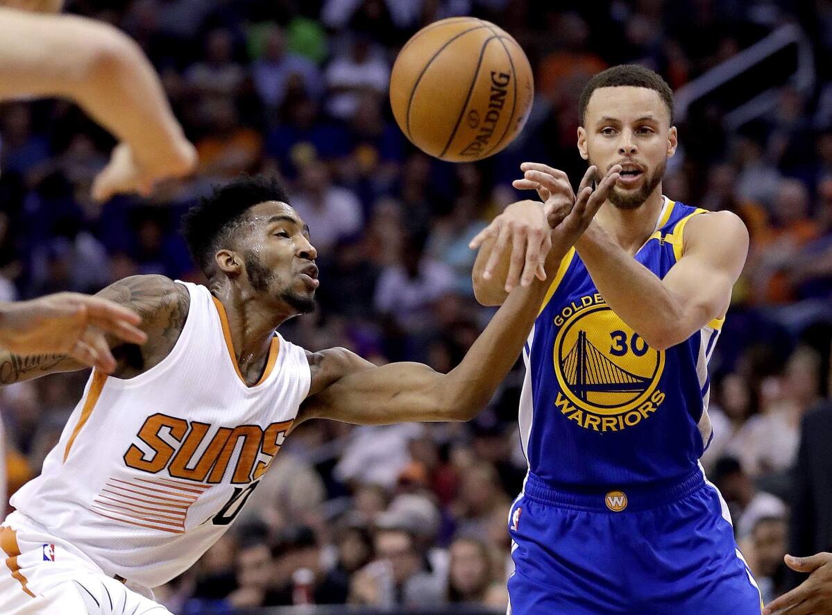Warriors clinch Western Conference's top seed with win against Suns