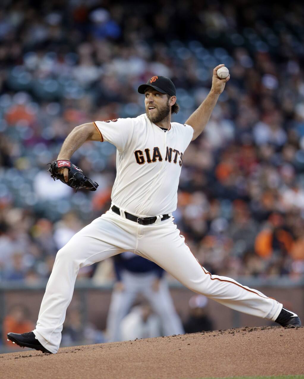 Giants' Madison Bumgarner beats Brewers for 7th win in row