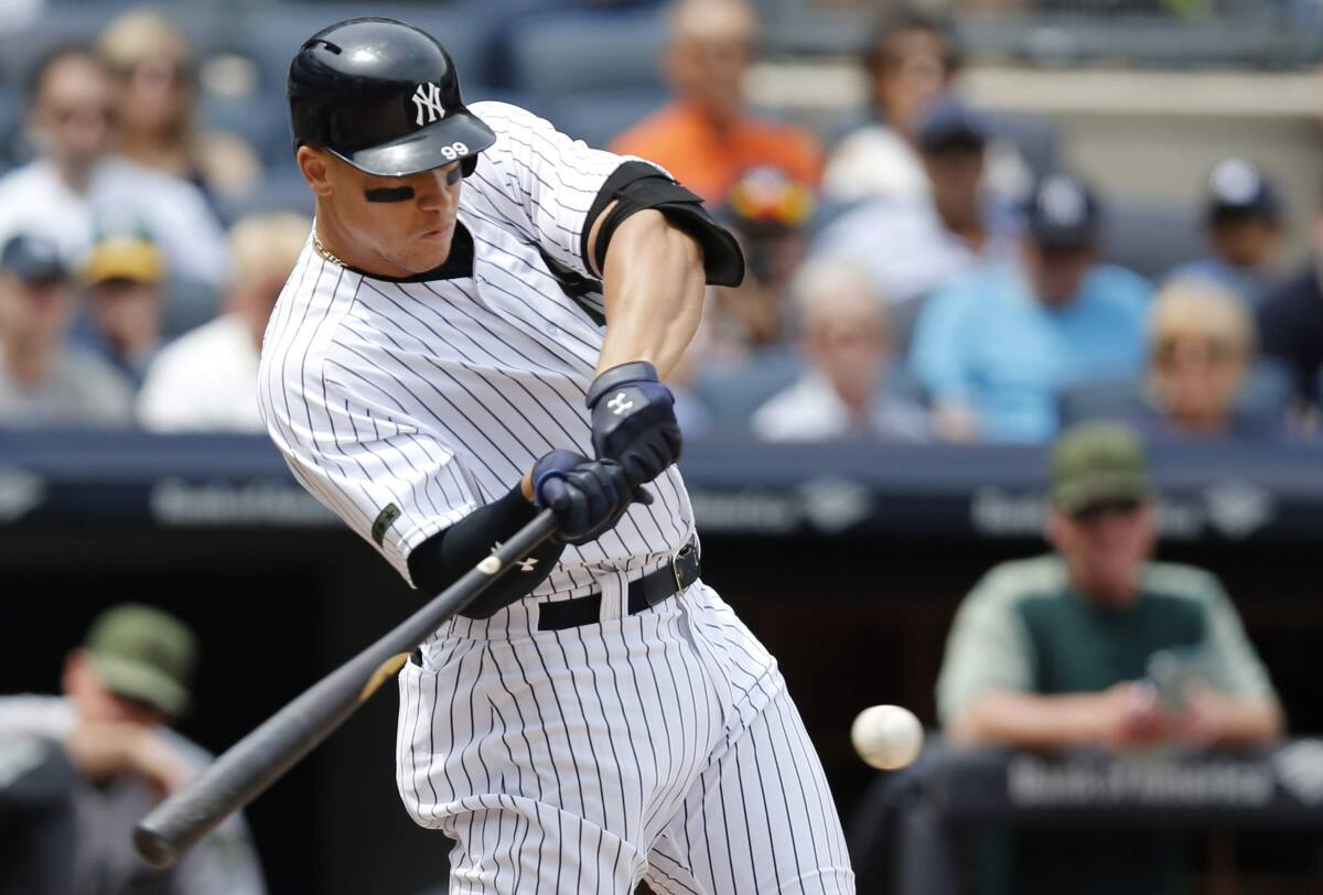 New York Yankees hit record three grand slams, rout Oakland A's 22-9 – The  Mercury News