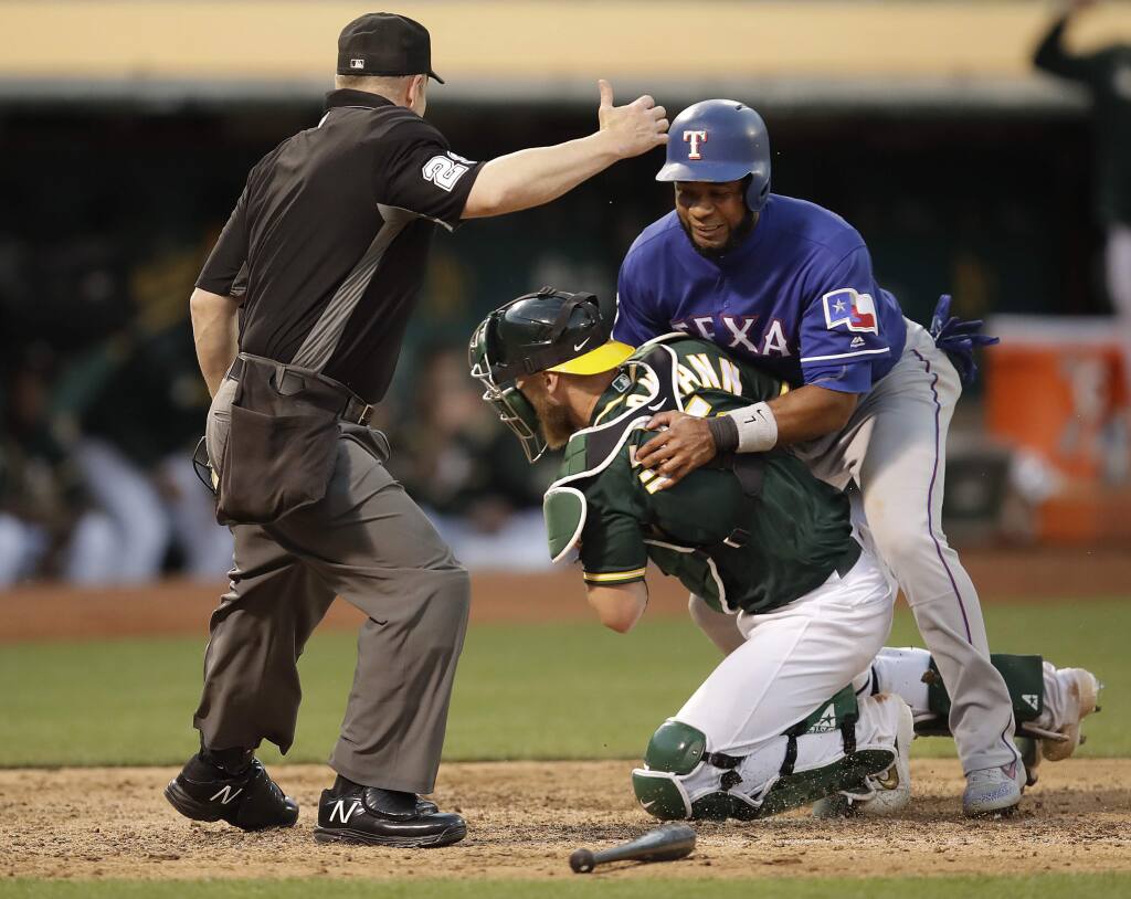 Tempers flare as A's edge Rangers 5-4