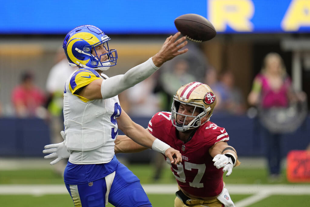 49ers force 2 late turnovers and hold on for a 30-23 rivalry victory over  the LA Rams
