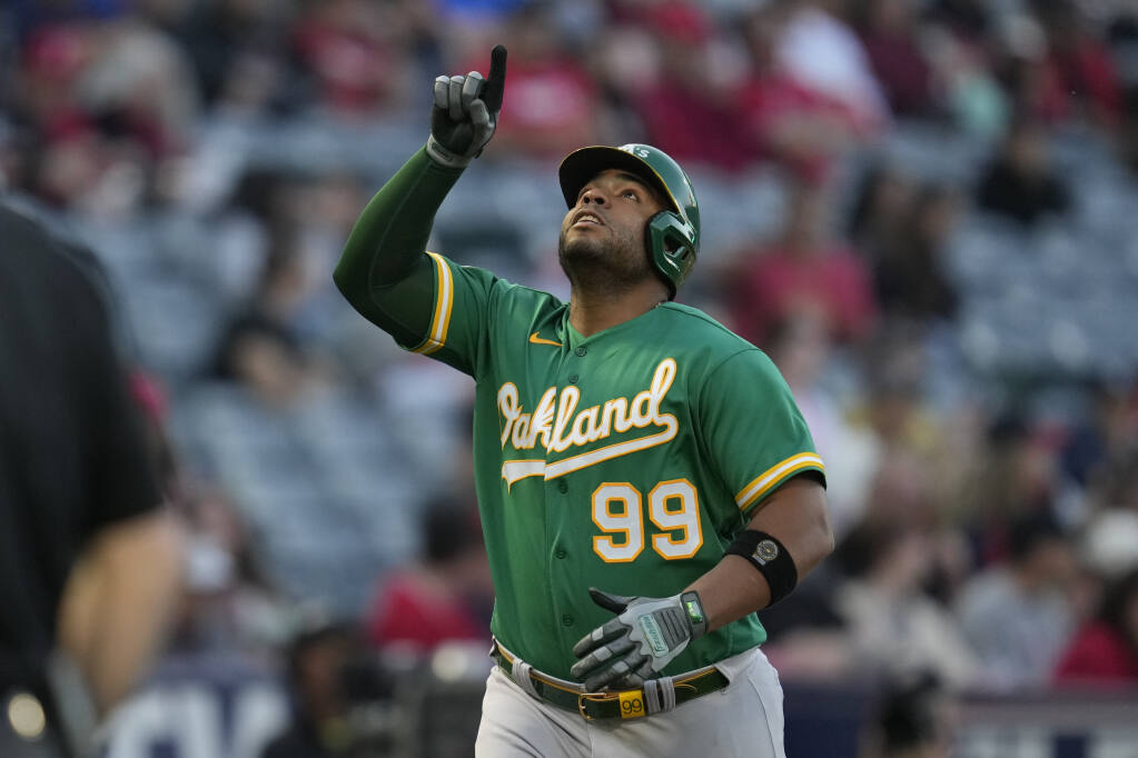 A's hit 5 home runs, rally for 11-10 win over Angels in 10