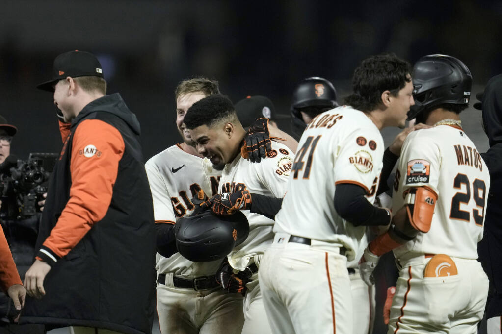 Giants beat Guardians 5-4 to keep pace in NL wild-card chase