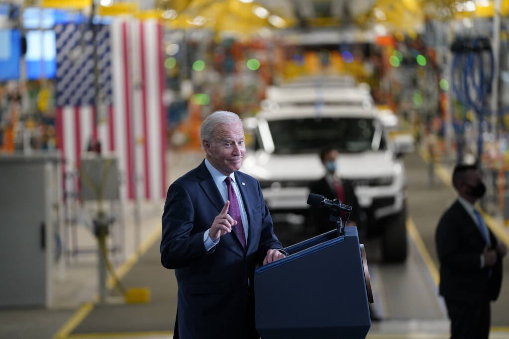Biden pushes electric vehicle chargers as energy costs spike