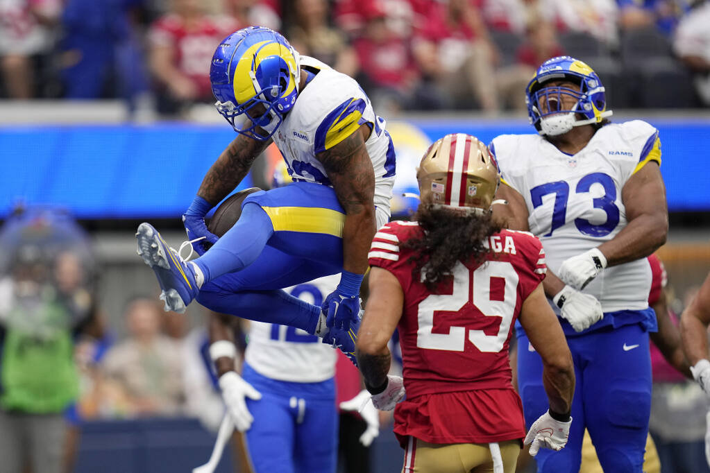 49ers force 2 late turnovers and hold on for a 30-23 rivalry victory over  LA Rams