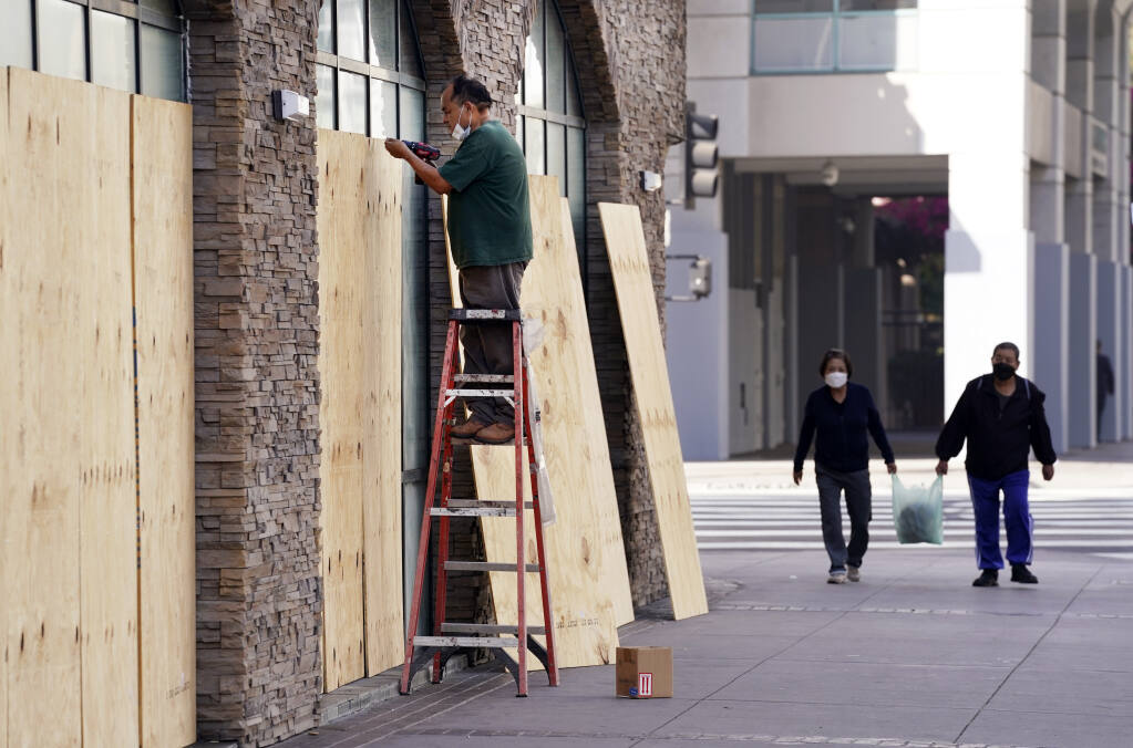 NYC's 5th Avenue prepares for more riots with boarded windows