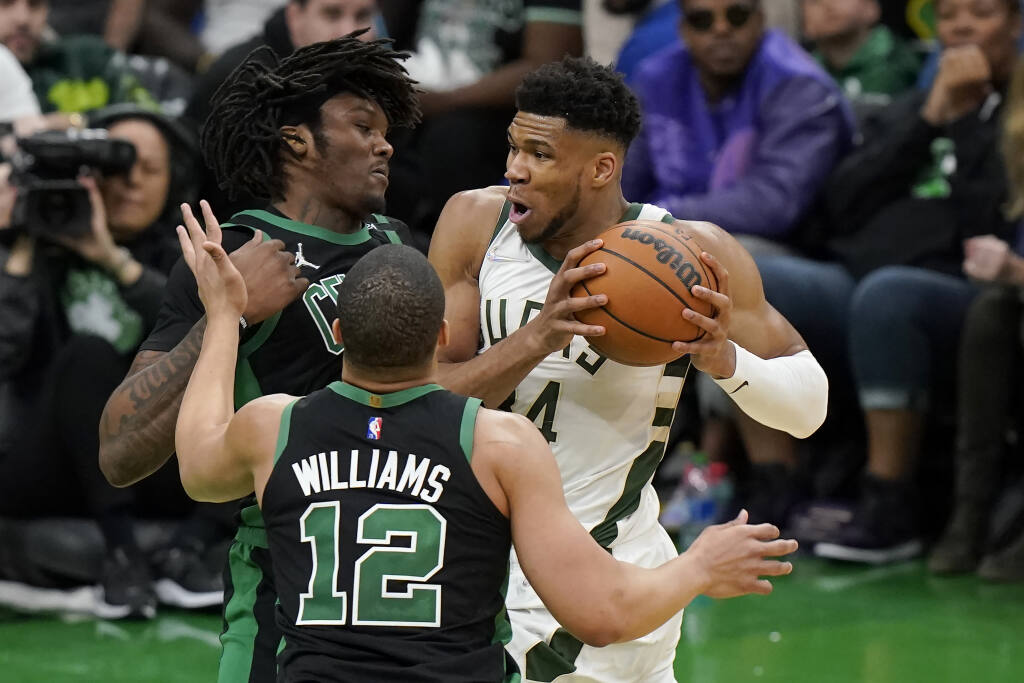 Boston Celtics' Grant Williams dunks the ball as Chicago Bulls