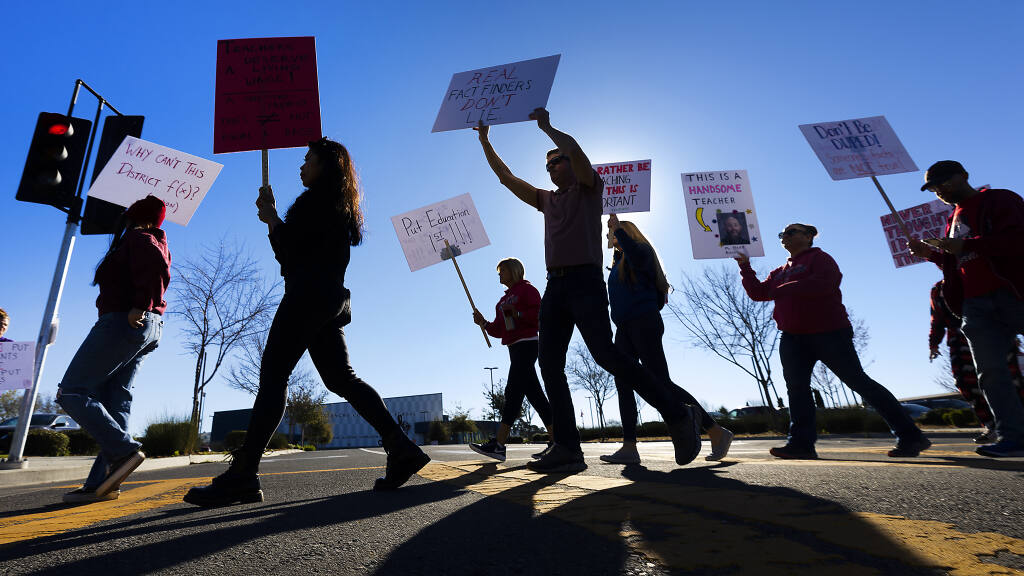Rancho Cotate High School teachers marched the picket line in front of