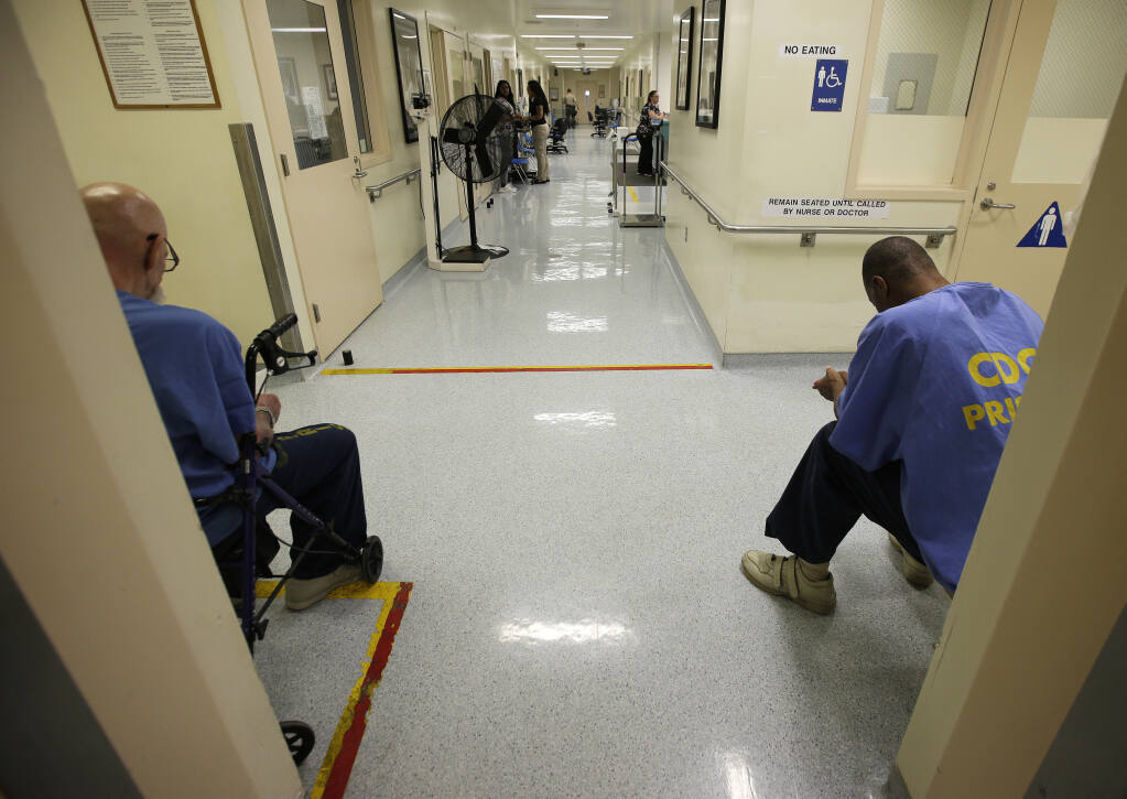 California urged to move inmates to front of vaccine line