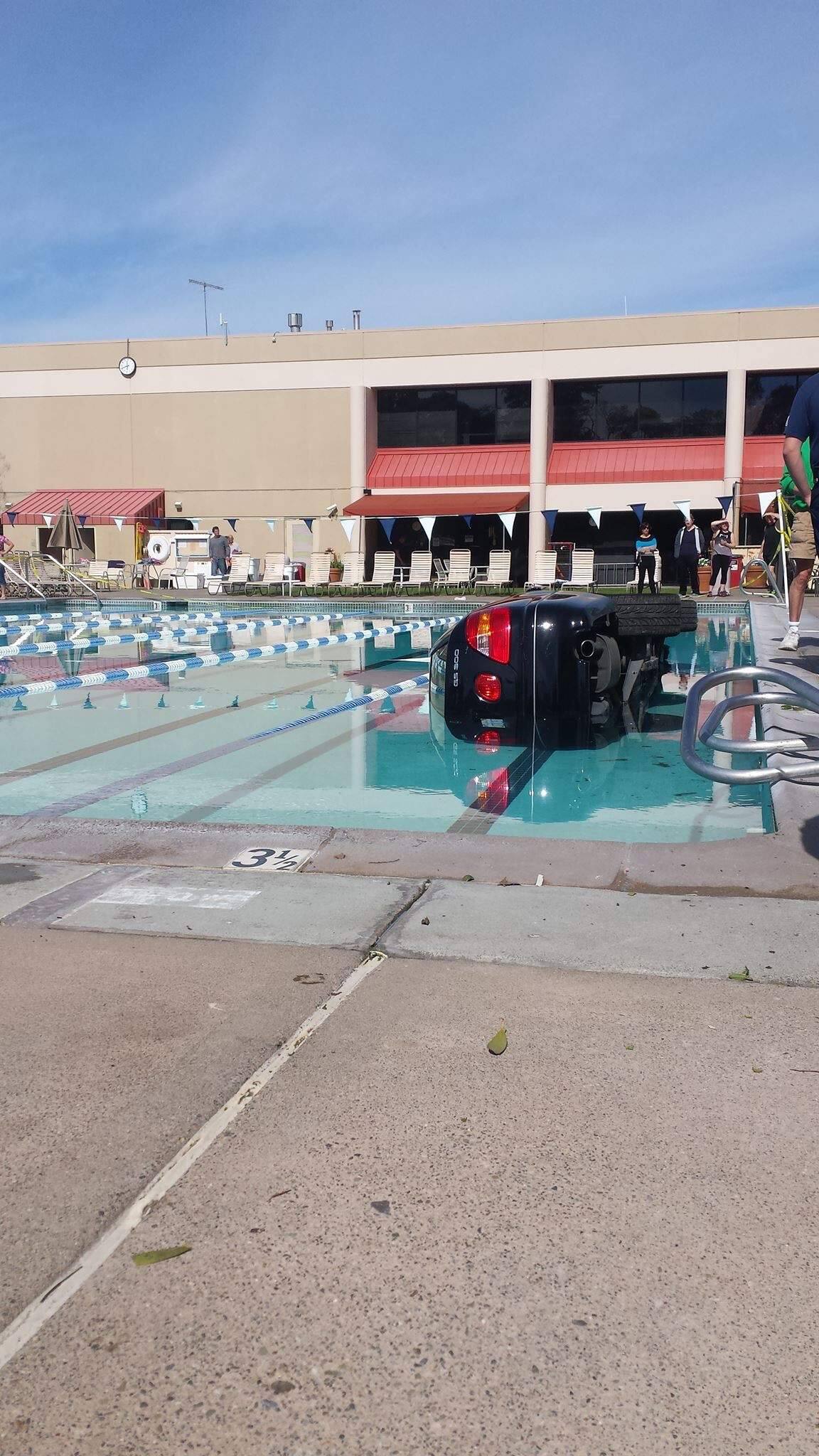 Car Crashes Into Airport Health Club Pool