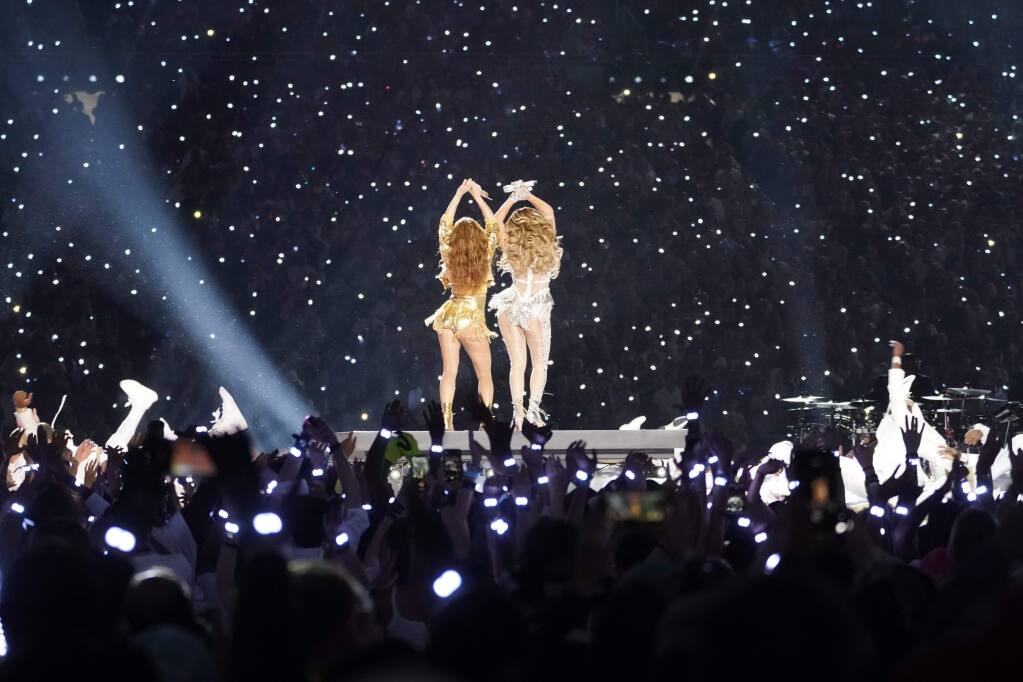 Shakira, left, and Jennifer Lopez during the halftime show of Super Bowl LI...