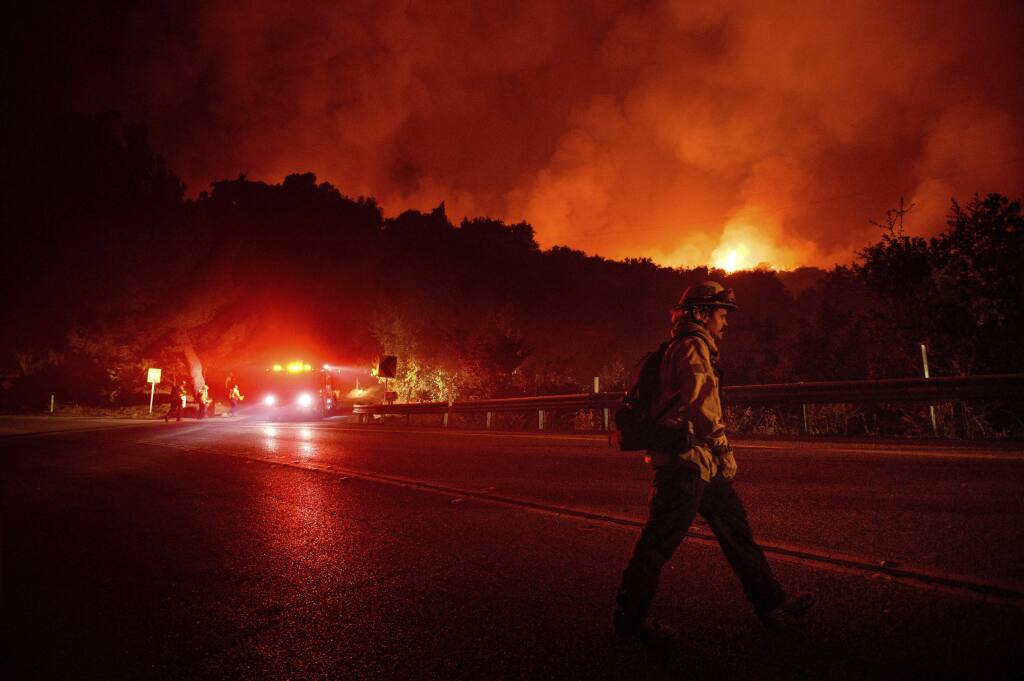 Santa Barbara Firefighters Douse Tree Fire Along Highway 