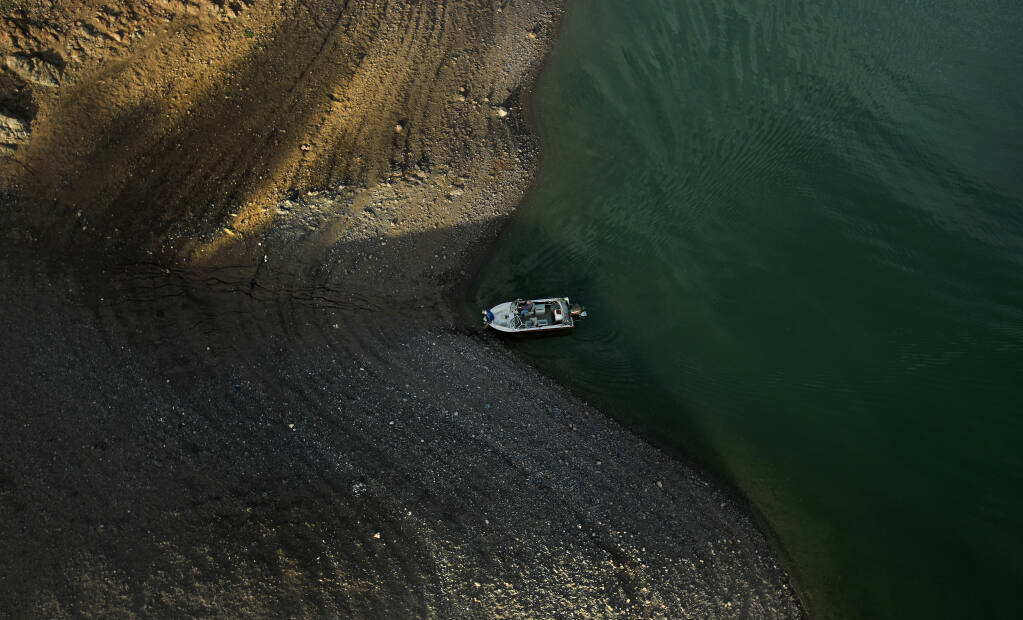 A growing shoreline at Lake Sonoma, Friday, Jan. 15, 2021 underlines the lack of rainfall this winter.  (Kent Porter / The Press Democrat) 2021
