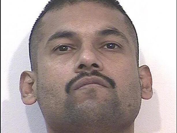 This Nov. 18, 2019, photo provided by the California Department of Corrections and Rehabilitation shows inmate Noe Herrera at Kern Valley State Prison in Delano, Calif. Authorities say the death of 50-year-old inmate Alfredo Valenzuela at a Southern California prison is being investigated as a homicide. Valenzuela was found unresponsive Saturday, April 30, 2022, in his cell at Kern Valley State Prison and was pronounced dead a short time later. Valenzuela's cellmate, Herrera, was moved to the prison's Administrative Segregation Unit pending investigation. (CDCR via AP)