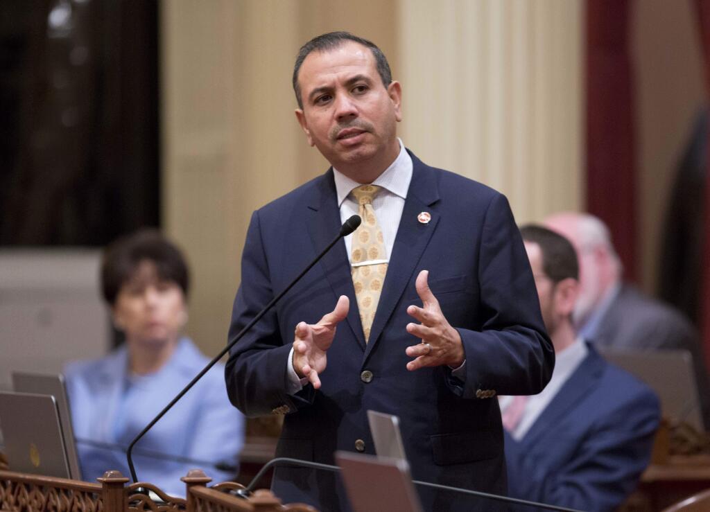 FILE - In this Jan. 3, 2018, file photo, California Sen. Tony Mendoza, D-Artesia, announces that he will take a month-long leave of absence while an investigation into sexual misconduct allegations against him are completed in Sacramento, Calif. He has sued the state Senate for suspending him amid a sexual misconduct investigation. Mendoza is seeking reinstatement in his lawsuit filed Thursday, Feb. 15, with one of his constituents as a co-plaintiff. (AP Photo/Steve Yeater, file)