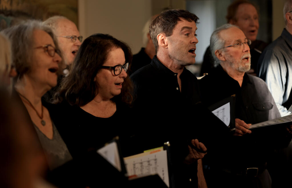 The Acorn MusEcology Project choral ensemble performs “Side by Side: Songs in Conversation” at Great Blue Heron Hall during a fundraiser for the Laguna de Santa Rosa Foundation near Sebastopol, Saturday, Jan. 6, 2024. (Kent Porter / The Press Democrat)