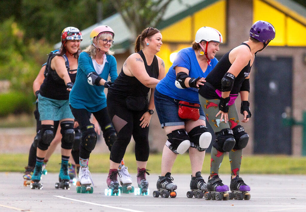 Roller derby enthusiasts from around Sonoma County gathered for a skate night at Vintage Meadows Park in Cloverdale, Tuesday, July 25, 2023. (John Burgess / The Press Democrat)