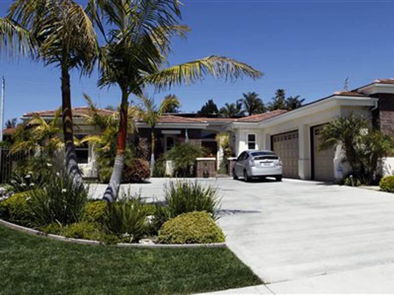 The home of former 'Survivor' producer Bruce Beresford-Redman and his wife Monica is seen in the Los Angeles suburb of Rancho Palos Verdes, Calif., Thursday, April 8, 2010. (AP Photo/Reed Saxon)