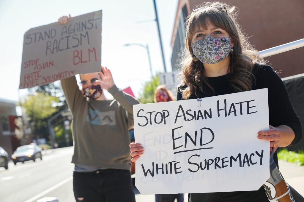 Olivia Cordis participates in a rally to protest incidents of nationwide racism at Old Courthouse Square in Santa Rosa on Friday, March 19, 2021.  (Christopher Chung / The Press Democrat)